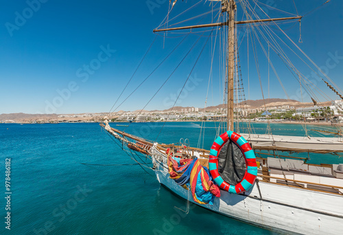 Marina with moored yachts and pleasured boats at the tourist resort located o...