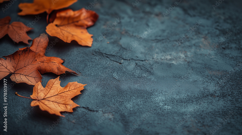 Dried autumn leaves rest on a dark textured surface, creating a poignant atmosphere filled with melancholy, perfect for reflecting on change and loss, copy space Dried autumn leaves rest on a dark textured surface, creating a poignant atmosphere filled with melancholy, perfect for reflecting on change and loss, copy space