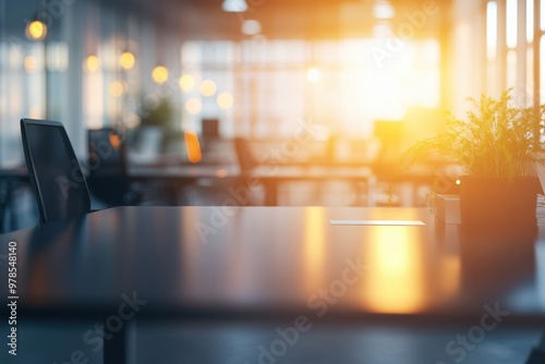 Wallpaper Mural A sunlit office space with a desk, chair, and plant, creating a warm, inviting atmosphere. Torontodigital.ca