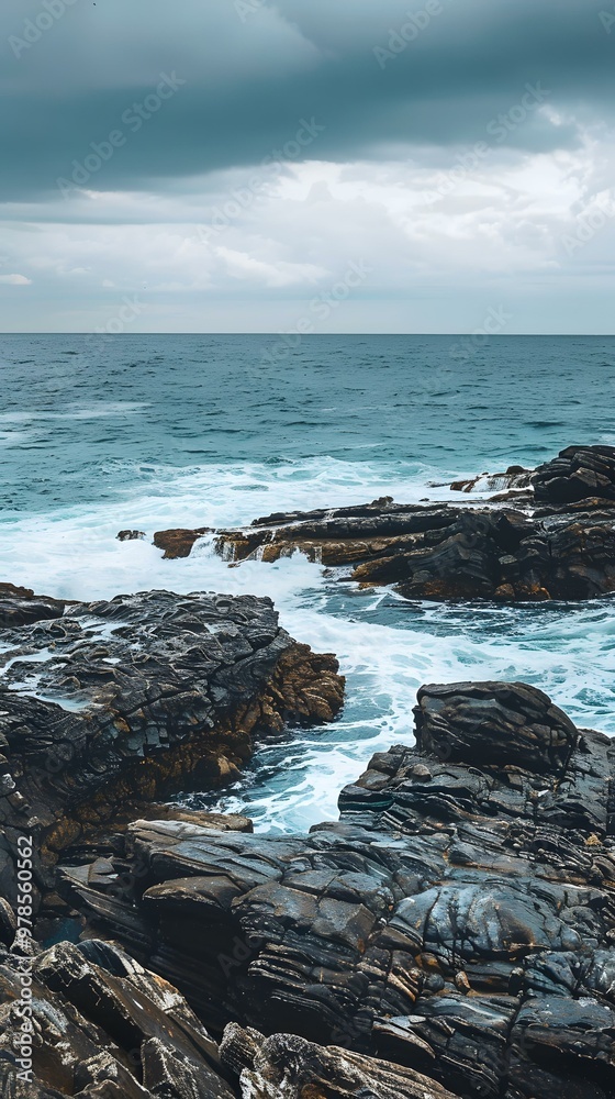 Rocky Coastline With Ocean Waves Crashing On The Rocks Rocky Coastline With Ocean Waves Crashing On The Rocks