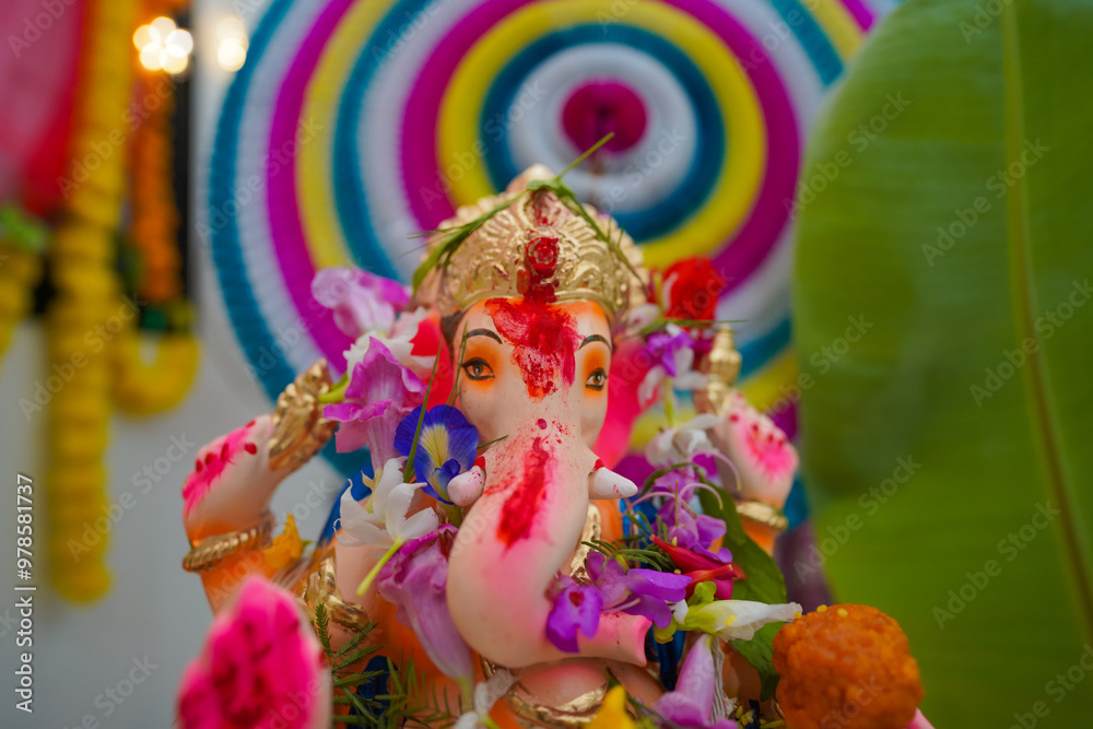 Ganesha In Home, ganesh idol at home on ganesh chaturthi, Beautiful clay statue/Idol of an Indian god Lord Ganesha decorated stock photo. Ganesha In Home, ganesh idol at home on ganesh chaturthi, Beautiful clay statue/Idol of an Indian god Lord Ganesha decorated stock photo.