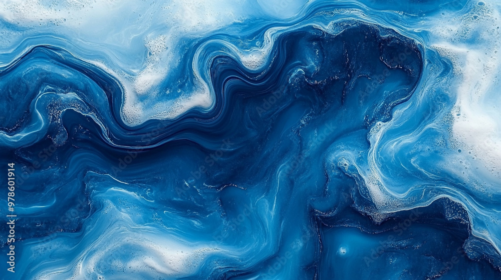 Obraz premium A mesmerizing abstract blue marble texture, showcasing fluid patterns and tranquil tones, perfect for creative projects.