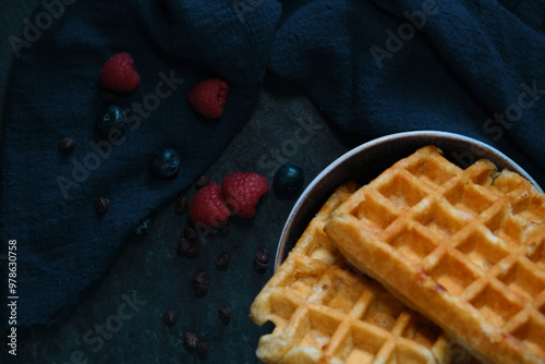 Belgian waffles on a dark background
