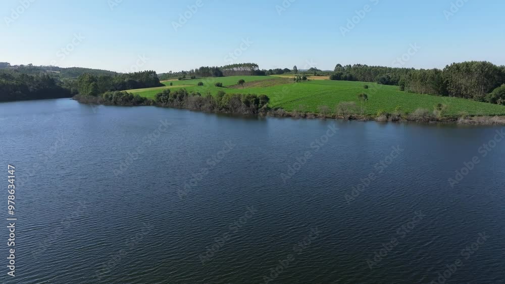 Scenic Landscape With Lake And Green Fields Scenic Landscape With Lake And Green Fields