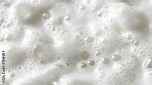 Close Up of White Foamy Texture with Air Bubbles in a Smooth, Light Background