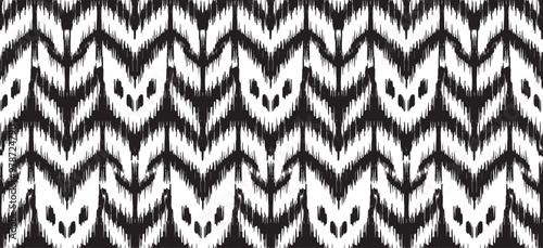 Ethnic abstract ikat art. Seamless pattern zigzag in tribal, Black White . Aztec geometric art ornament print.Design for carpet, wallpaper, clothing, wrapping, fabric, textile.