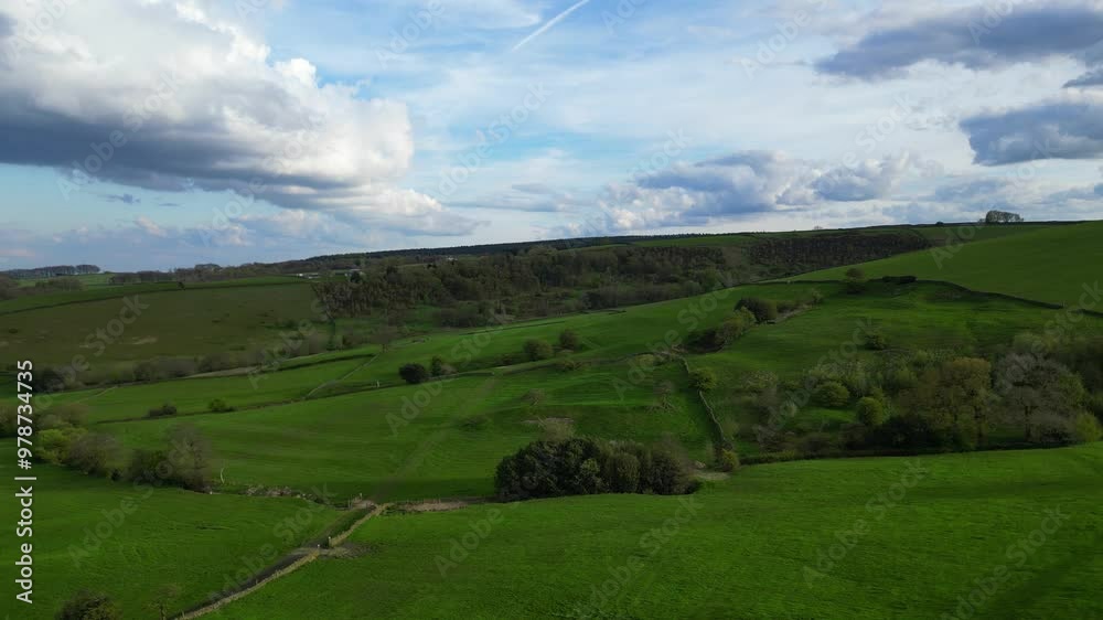 High Angle View of British Agricultural Farms at Countryside and Beautiful Landscape of Near Hills of Rotherham, England Great Britain of UK. April 30th, 2024 High Angle View of British Agricultural Farms at Countryside and Beautiful Landscape of Near Hills of Rotherham, England Great Britain of UK. April 30th, 2024