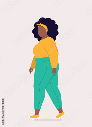 Side View Of One Overweight Black Woman In Sports Clothing Walking.