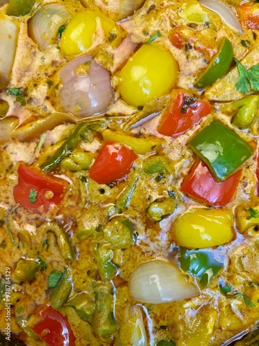 Tandori Capsicum masala in a pink ceramic plate.