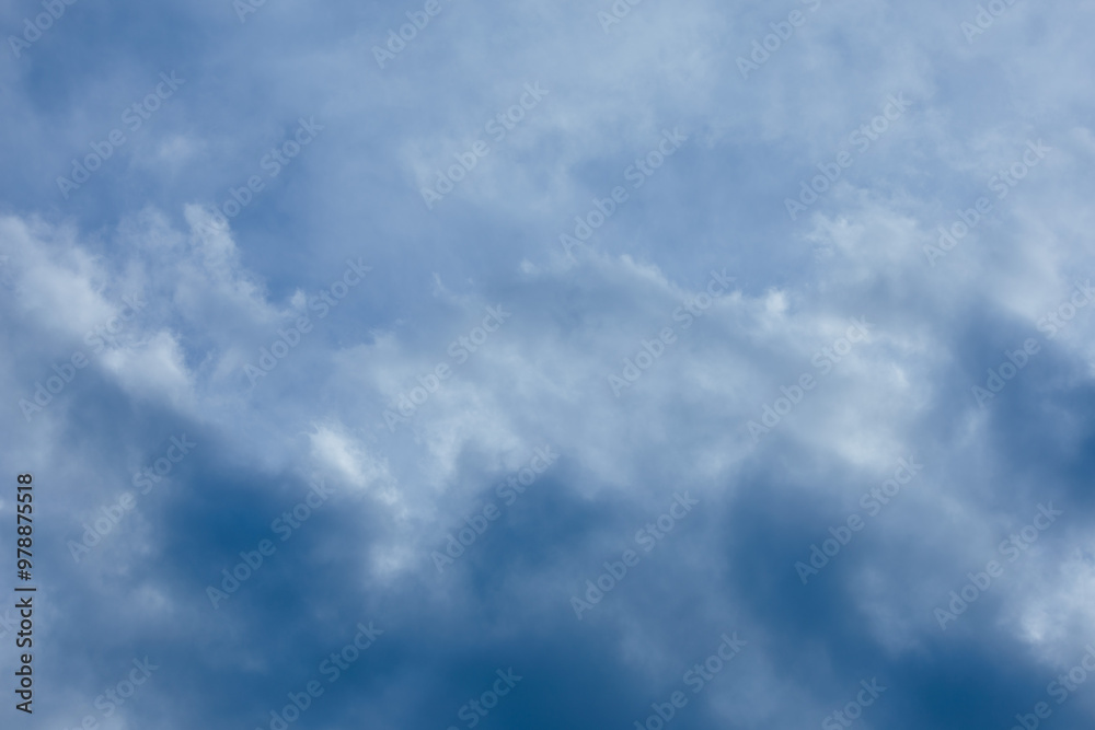 Blue sky and white and gray clouds. Texture background for design. Blue sky and white and gray clouds. Texture background for design.