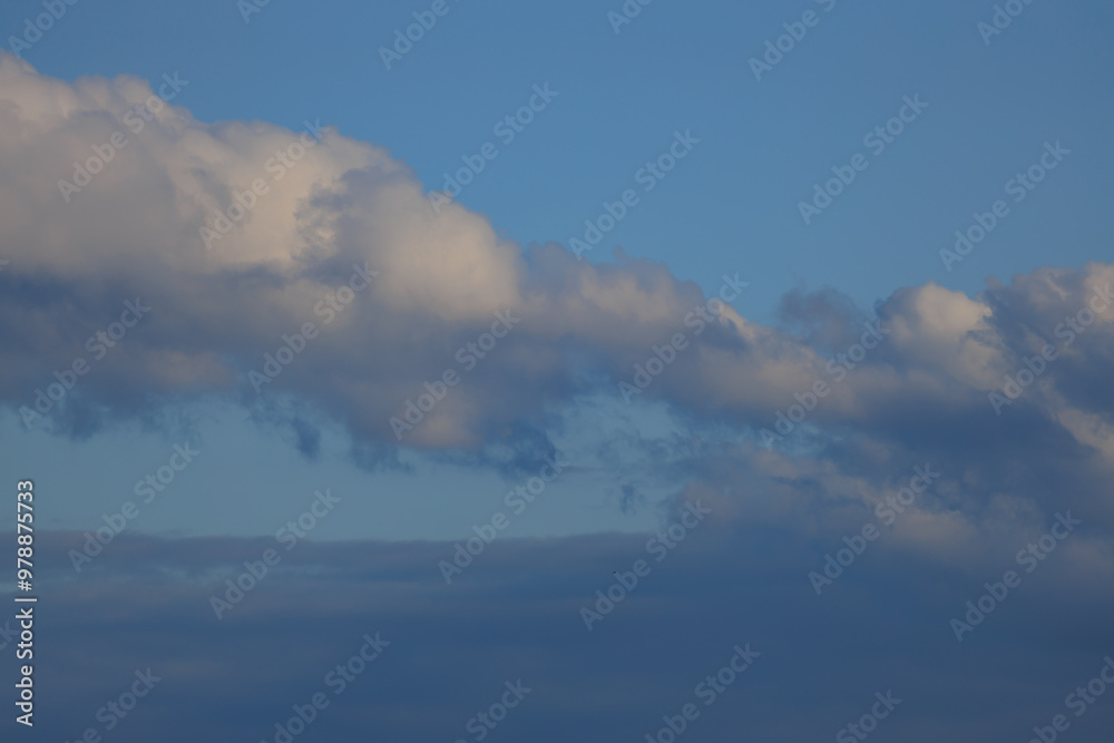 Blue sky and white and gray clouds. Texture background for design. Blue sky and white and gray clouds. Texture background for design.
