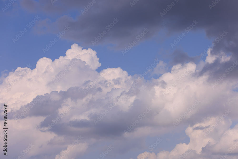 Blue sky and white and gray clouds. Texture background for design. Blue sky and white and gray clouds. Texture background for design.