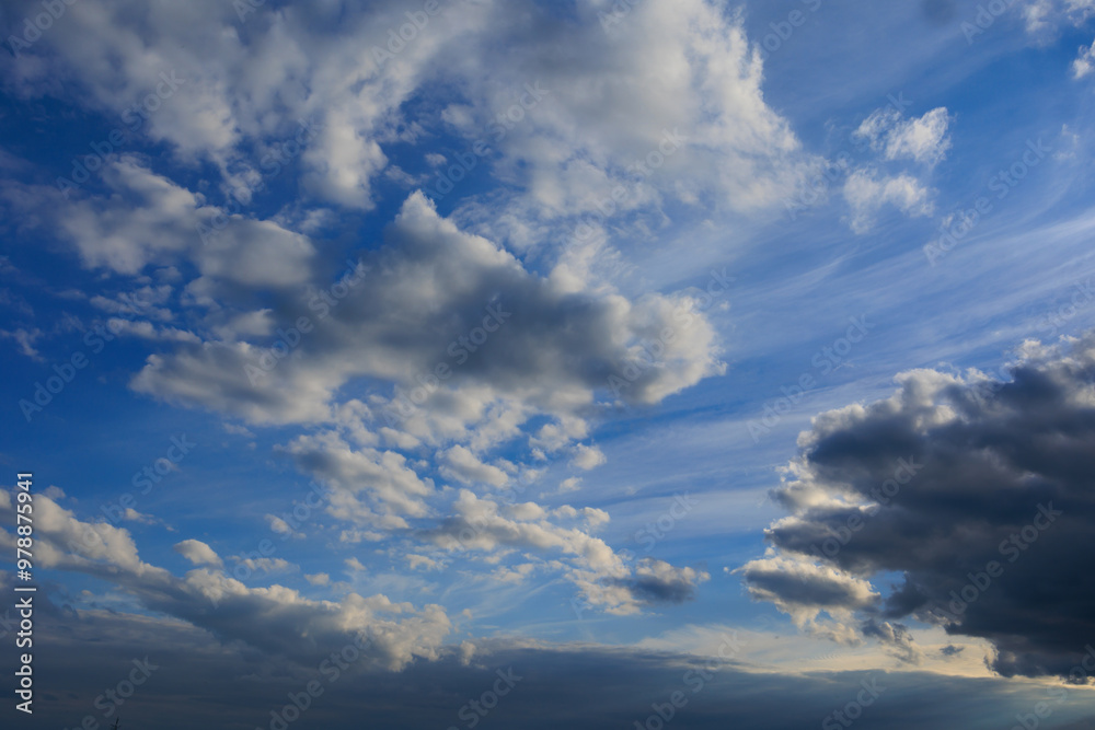 Blue sky and white and gray clouds. Texture background for design. Blue sky and white and gray clouds. Texture background for design.
