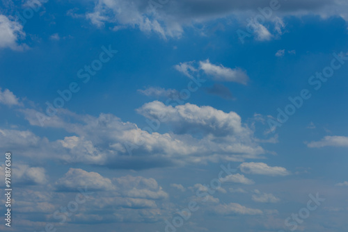 Blue sky and white and gray clouds. Texture background for design.