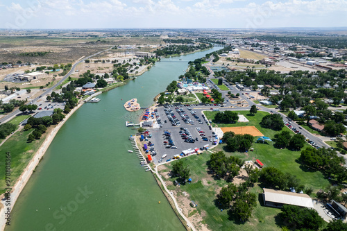 Aerial view of the beautiful Pecos River and vibrant water park amidst the cityscape of Carlsbad, New Mexico. photo