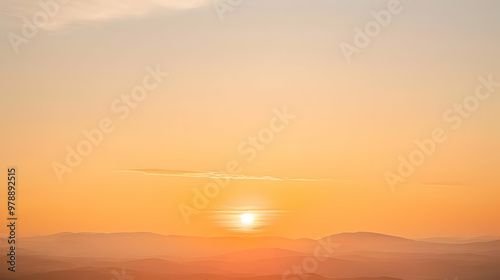 A Beautiful Sunset Over a Mountain Range, the Sky Blending Into Orange and Pink Hues, with Clouds and a Sun Setting in the Distance, a Tranquil and Serene View