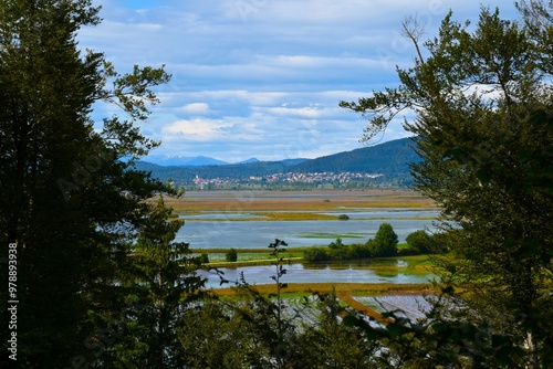 View of Cerknica town and lake Cerknica in Notranjska, Slovenia photo