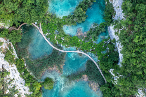 Aerial view of serene Plitvice Lakes National Park with turquoise waters and lush forest, Plitvicka Jezera Municipality, Croatia.