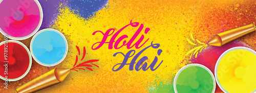 Top view of header or banner design with color bowls and water guns on color splash background with text Holi Hai (It's Holi). photo