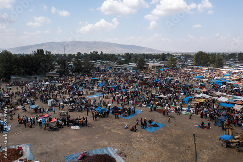 Aerial view of a bustling traditional market with colorful stalls and busy vendors, Halaba Kulito, Ethiopia. photo