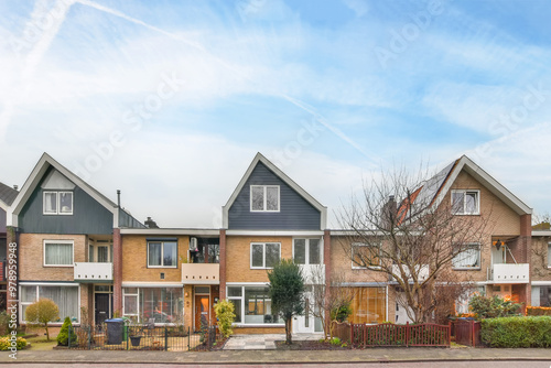 Quiet suburban street with modern houses photo