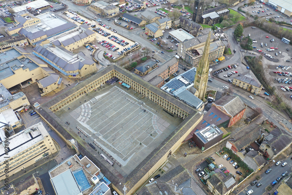 Aerial photo of the famous Piece Hall in the Blackledge area of Halifax in Calderdale in West Yorkshire, England, showing the historic stone build building in the town centre. Aerial photo of the famous Piece Hall in the Blackledge area of Halifax in Calderdale in West Yorkshire, England, showing the historic stone build building in the town centre.