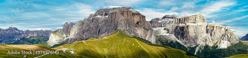 Panorama vom Grödnertal über Sellastock zum Piz Boè und Sass Pordoi in den Dolomiten photo