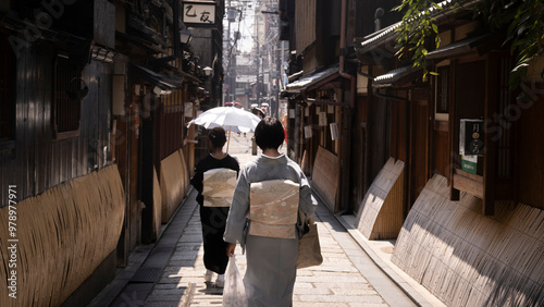 girls with a kimono walking in the city