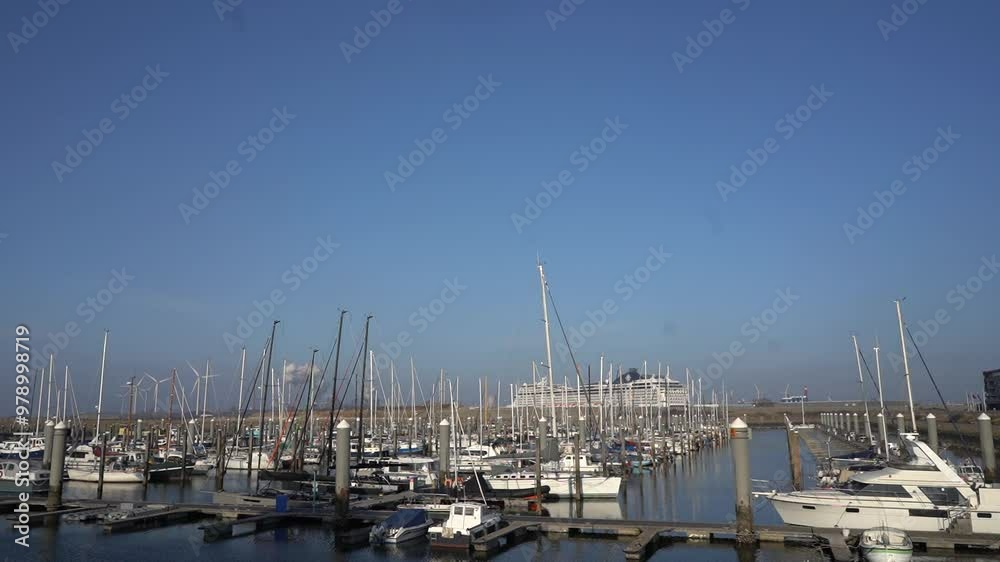 Ijmuiden the Netherlands September 2024: View of the pier with moored yachts and boats in Netherlands Ijmuiden. Yacht parking. A marina lot. dock berth parking for boats and yachts. Ijmuiden the Netherlands September 2024: View of the pier with moored yachts and boats in Netherlands Ijmuiden. Yacht parking. A marina lot. dock berth parking for boats and yachts.