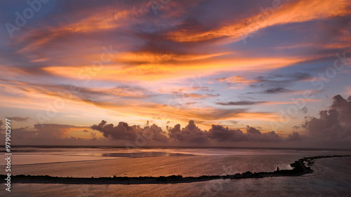Aerial view of a tranquil sunset over the vibrant ocean and unspoiled reef, Bonaire, Caribbean Netherlands.