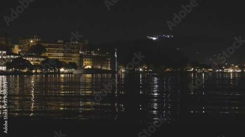 Night View of Lake City with Dramatic Lighting from Unique Perspective photo