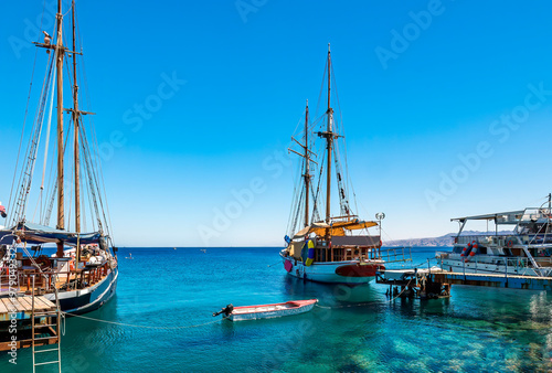 Marina with moored yachts and pleasured boats at the tourist resorts located ...