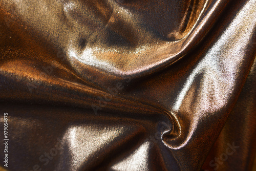 Photos bronze nylon and spandex lame fabric in soft folds
