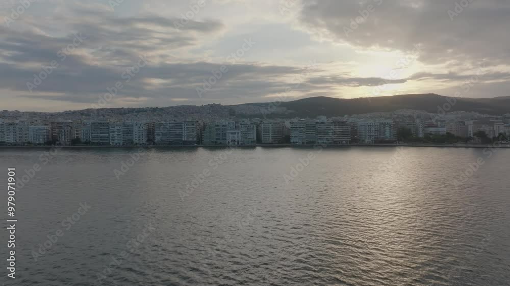 Flying towards Thessaloniki, Greece at sunrise with clouds Flying towards Thessaloniki, Greece at sunrise with clouds