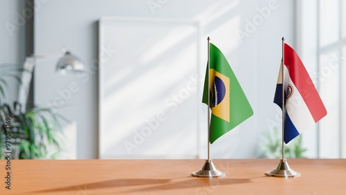 FLAGS OF BRAZIL AND PARAGUAY ON TABLE