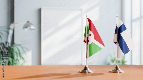 FLAGS OF BURUNDI AND FINLAND ON TABLE