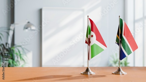 FLAGS OF BURUNDI AND SOUTH AFRICA ON TABLE