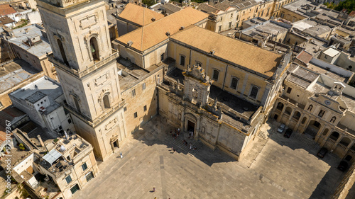 Aerial view of the entrance of cathedral of Lecce, in Apulia, Italy. The metropolitan cathedral of Santa Maria Assunta, called Duomo, is located in homonymous square in the historic center of the city photo