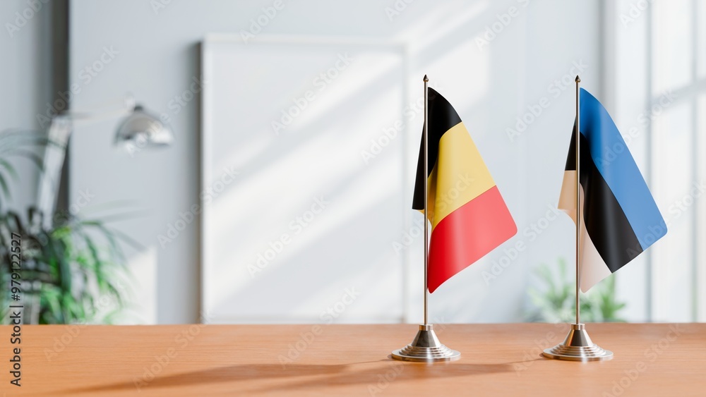 FLAGS OF CHAD AND ESTONIA ON TABLE FLAGS OF CHAD AND ESTONIA ON TABLE