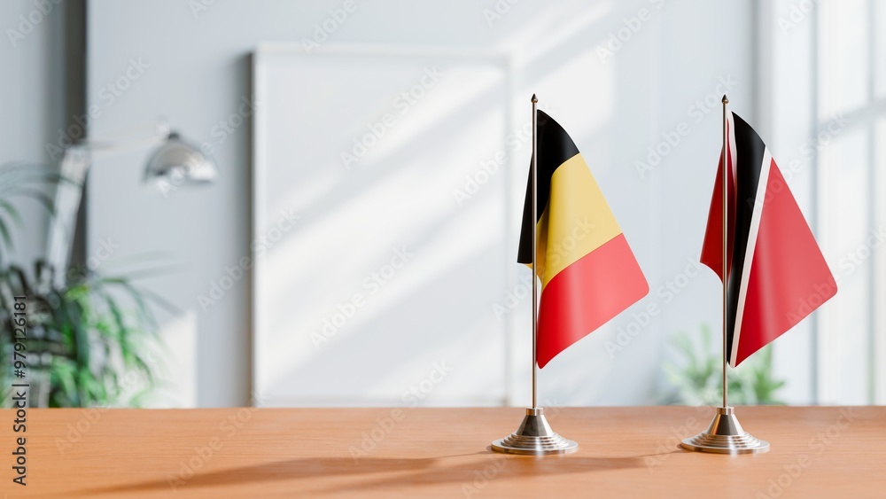 FLAGS OF CHAD AND TRINIDAD ON TABLE FLAGS OF CHAD AND TRINIDAD ON TABLE