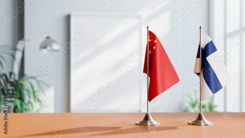 FLAGS OF CHINA AND FINLAND ON TABLE