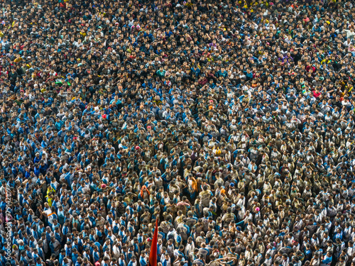 Aerial view of a vibrant crowd celebrating the Dahi Handi festival, Thane, India. photo