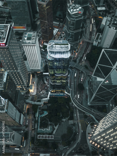 Aerial view of vibrant cityscape with bustling skyscrapers and busy roads, Hong Kong Central, Hong Kong. photo