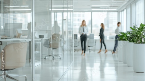 Modern Office Interior with Glass Walls and Blurred Businesspeople