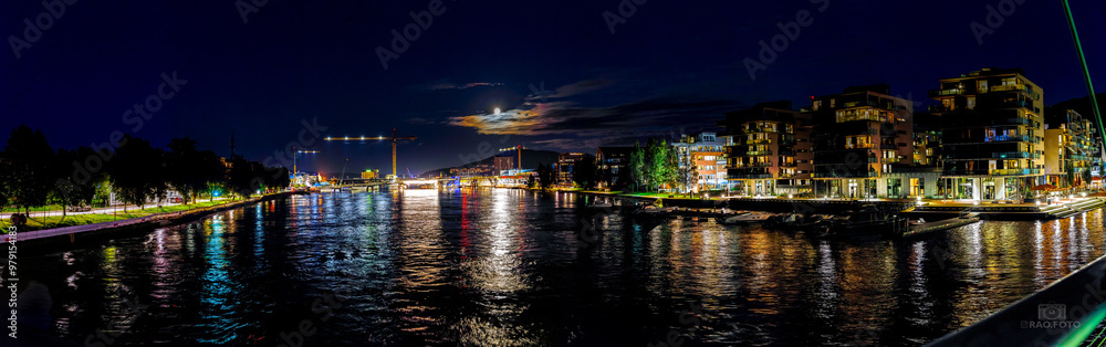 Fototapeta premium Drammen river at night, looking east from the Ypsilon bridge