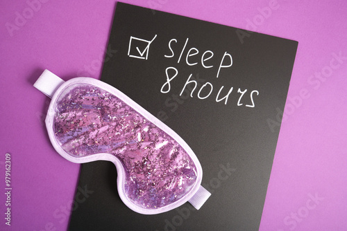 On the black chalk board is written the task to sleep 8 hours