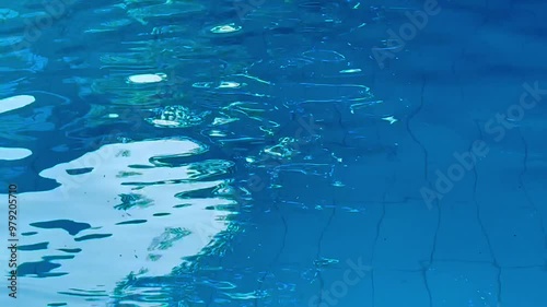 Blue pool water . Abstract background of water. Summer holidays concept.