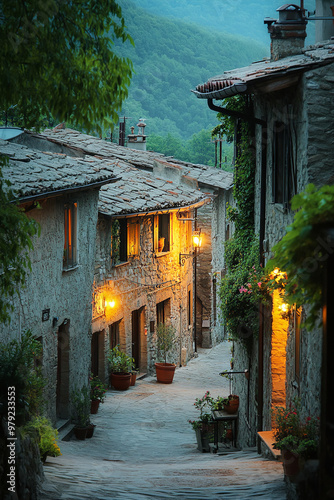 A peaceful evening in an Italian village, soft lights glowing from windows of stone houses photo