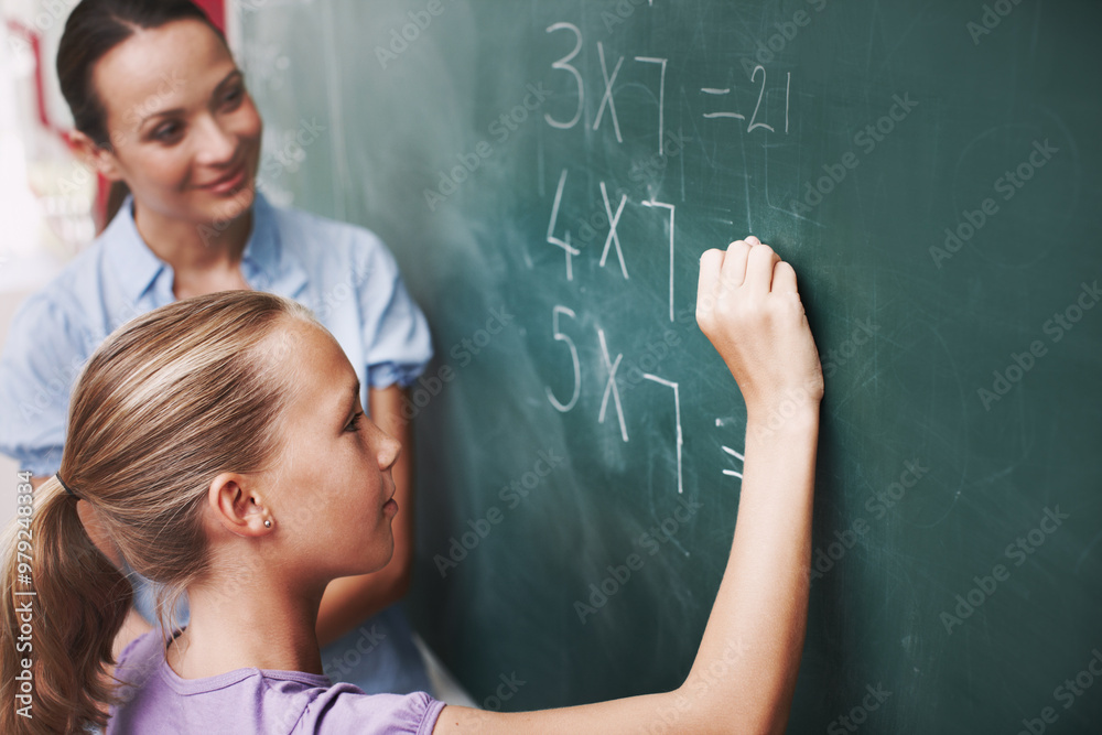Math, teacher and student writing on chalkboard in classroom for solving number problem and answer question. Lesson, girl and solution for multiplication at school with scholarship, quiz and learning Math, teacher and student writing on chalkboard in classroom for solving number problem and answer question. Lesson, girl and solution for multiplication at school with scholarship, quiz and learning
