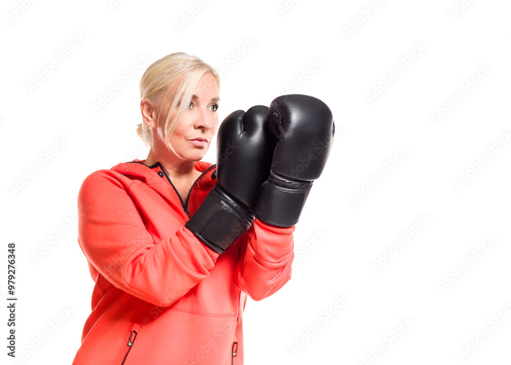 Confident Woman Training in Boxing Gloves Confident Woman Training in Boxing Gloves